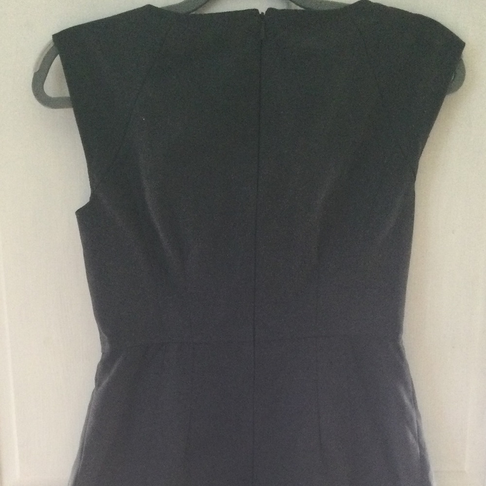 Grey dress size 2 with pockets in the sides and zipper in the back